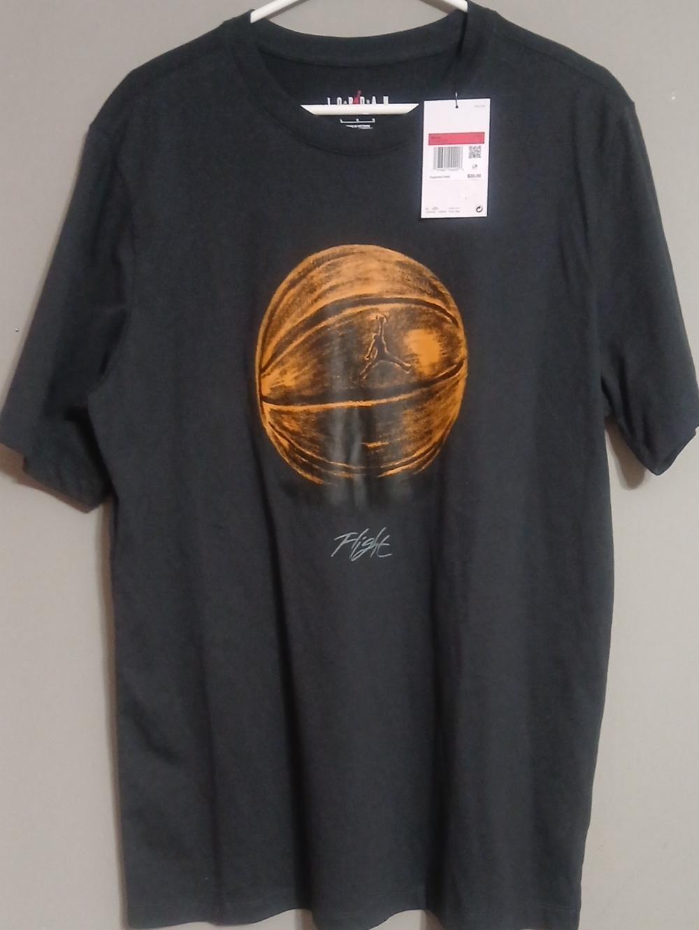 Jordan Flight Men's Black Graphic T-Shirt with Orange Basketball Print